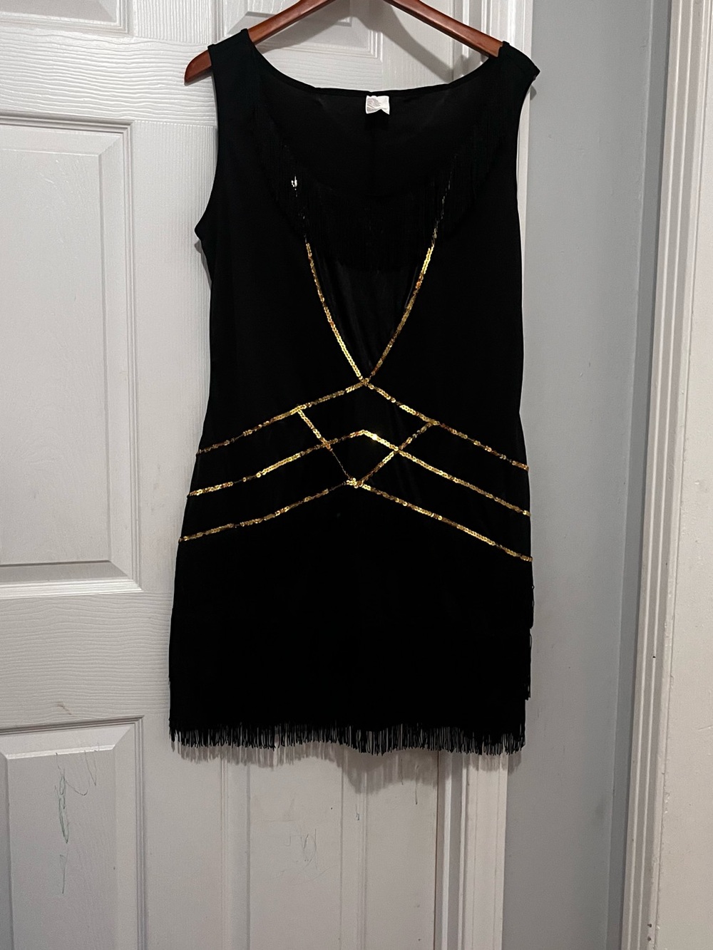 Black Sleeveless Dress with Gold Sequin Accents